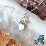 anjo com a pedra citrino